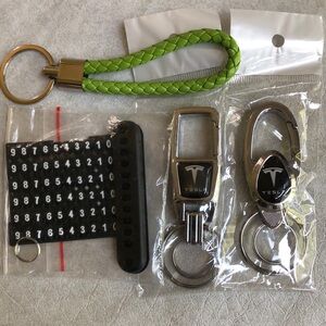 Tesla  2 Metal Snap Swivel Keychains With Extra Braided Keychain + Number Holder